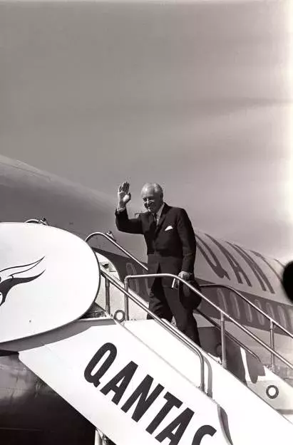 Harold Holt boarding a plane. 