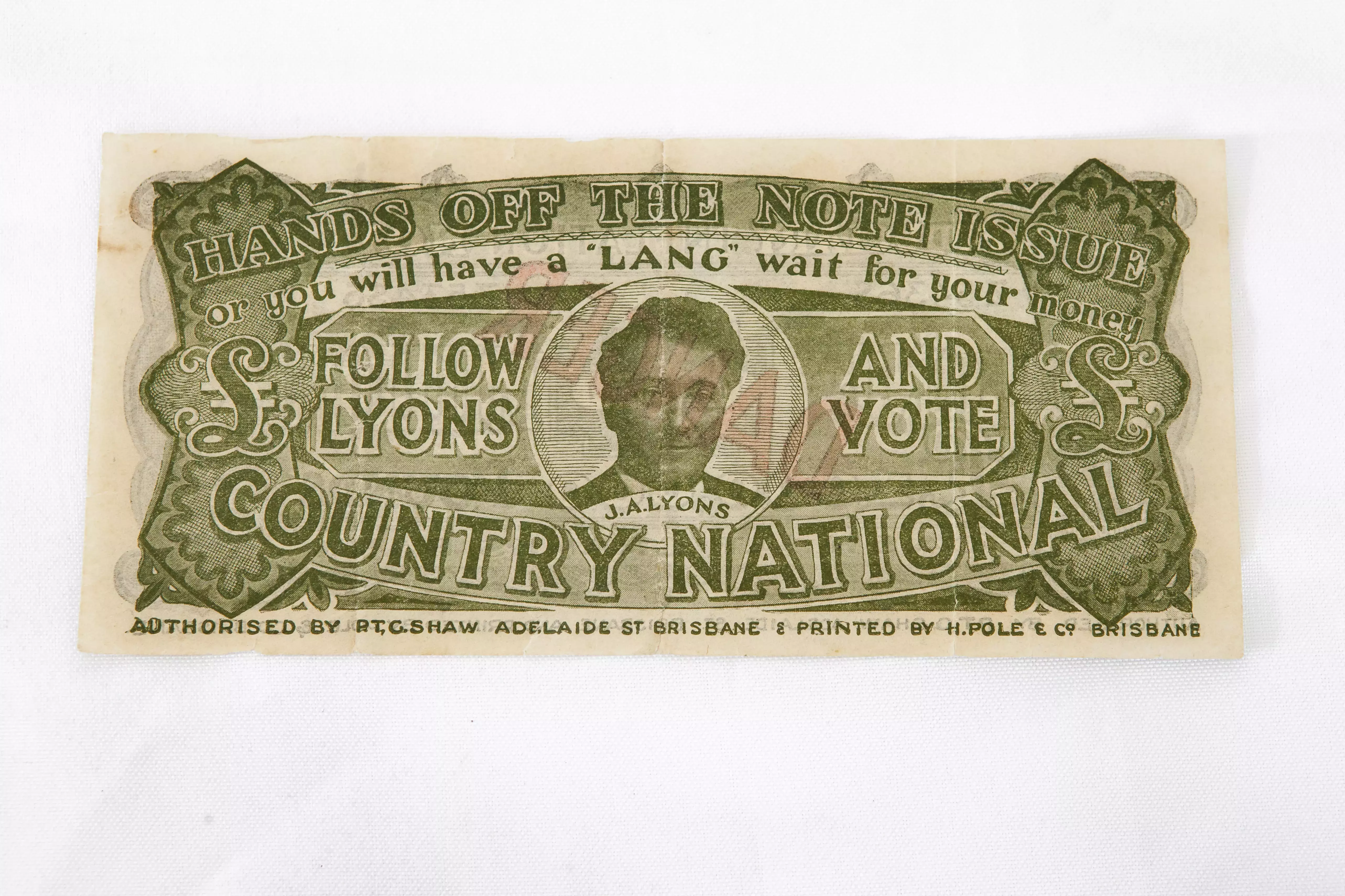 A million pound note of currency with green and white text that reads 'Follow Lyons and vote, Country National'