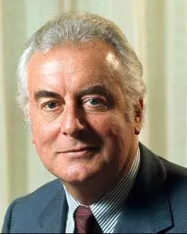 A colour portrait photograph of Gough Whitlam, looking at the camera 